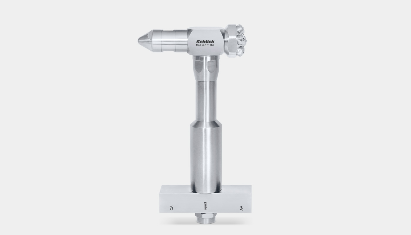 SCHLICK Pharma Spray-unit with flange standing on the connection. Nozzle head angled 90 degrees. Equipped with Model 937 two-substance nozzles.
