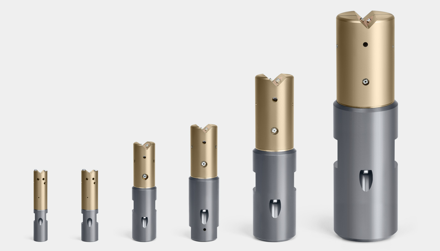 SCHMIDT EHS rotating nozzles model ROT FRV. Lined up in all 6 sizes (ø 10, ø 12, ø 18, ø 22, ø 31, ø 47 mm), standing side by side. Material: high-grade steel/bronze.